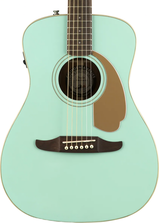 A Fender acoustic guitar in mint green with a dark brown neck and headstock, shown against a solid white background.