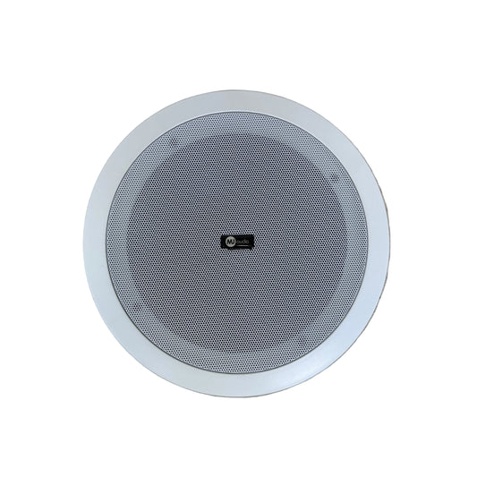A round white ceiling speaker with a gray mesh grille, shown from a top-down view on a light wood plank floor.