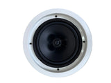 A top-down view of a round recessed ceiling speaker with a black cone and a white mounting frame, set against a light wood plank floor.
